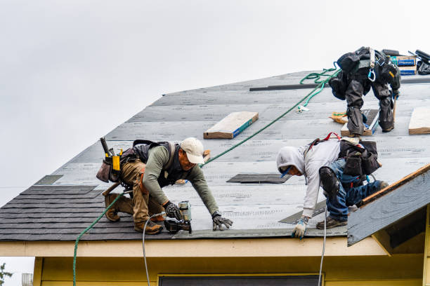 Professional Gutter Installation technician working in Greene, RI